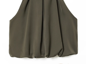 Detail of dark olive green halter top featuring soft draped pleats and bubble hem texture