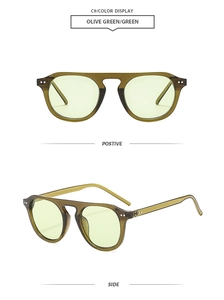 Detail view showing olive green frame and light green lenses of retro sun glasses