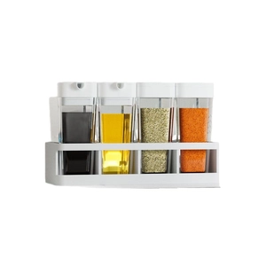 Japanese kitchen seasoning organizer set with 4 clear jars and white storage rack
