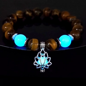Luminous beads and tiger eye stone bracelet with glowing lotus charm detail