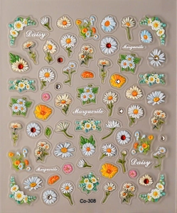 Detailed 3D embossed daisy nail stickers with floral patterns and sparkling rhinestones