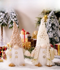 Detail of Christmas gnomes with knit sequins hats, candy cane and festive pearl buttons