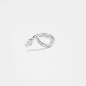 Detailed shot of S925 sterling silver stamp and zircon inlay on snake shaped open ring