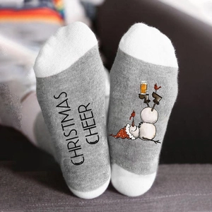 Cotton Christmas crew socks with snowman print and Christmas Cheer text on gray knit fabric