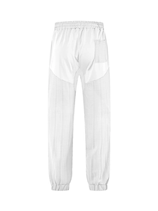 Rear view detail of white men's lounge pants with elastic waist and textured paneling