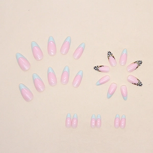 French leopard print press-on nails in lake green and pink almond shape with gold glitter