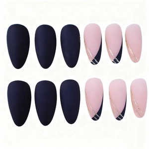 Matte black and pink stiletto press-on nails with glitter lines on white background
