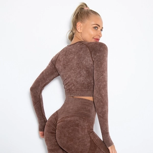 Close-up of seamless mocha acid wash yoga set featuring ribbed cuffs and side textures
