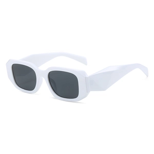 Fashionable square white chunky frame sunglasses with angular geometric cut temples