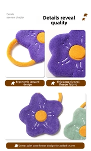 Detail of coral fleece hand towel with hanging loop in cute cartoon flower design