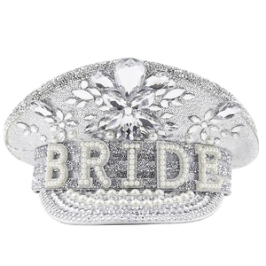 White sequin party hat with pearl BRIDE lettering and rhinestone floral accents