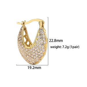 Detail view of gold pavé drop earrings with measurements 22.8mm by 19.2mm and weight 7.2g
