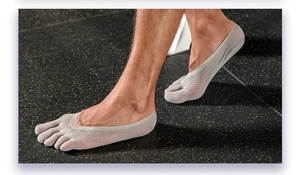 Close-up of light gray low-cut five-finger boat socks with non-slip knitted texture