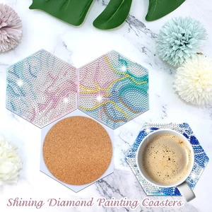 Close-up of DIY hexagonal diamond painting coasters with shiny rhinestones and cork base