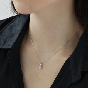 Elegant S925 sterling silver heart pendant necklace with sparkling zircon on a model