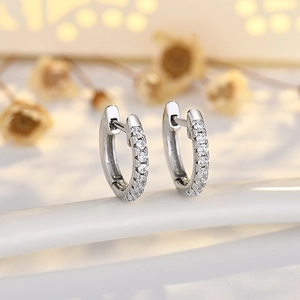 S925 sterling silver rivet hoop earrings with pavé zircons in a punk style design