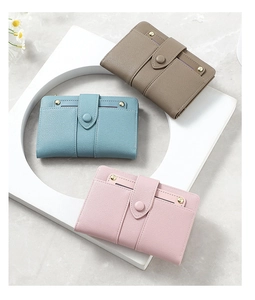 Three-color minimalist bifold wallets featuring pebble leather and metal rivet details