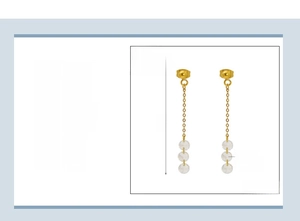 Detail of 48mm long 18K gold plated stainless steel tassel earrings with 5mm zircon crystals