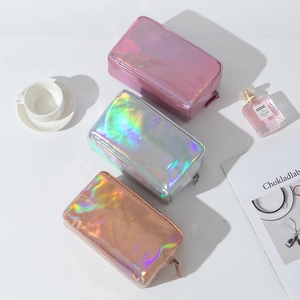 Three colorful laser PU makeup bags with iridescent waterproof finish and zipper detail