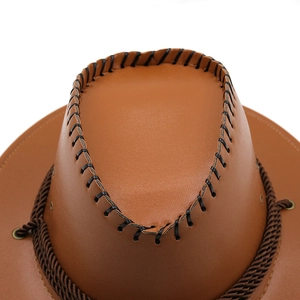 Close-up of brown faux leather cowboy hat with black stitching and braided cord detail