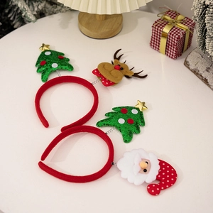 Detailed view of Christmas headbands with sequins and festive holiday party decorations