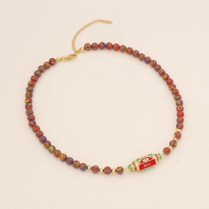 Beaded necklace with evil eye cylinder pendant and colorful striped beads on beige base