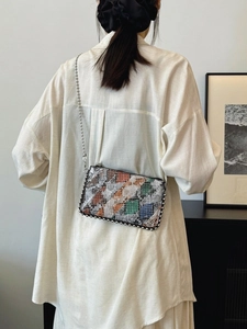 Women's chic crossbody envelope bag with colorful snakeskin patchwork and bead chain