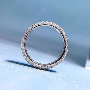 Macro detail of S925 sterling silver eternity ring with sparkling zircon pavé setting