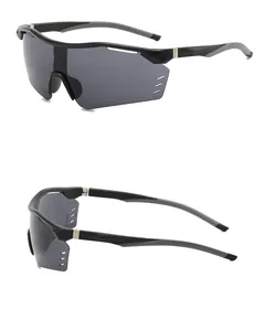 Detail view of matte black cycling sunglasses with smoke lenses and side ventilation vents