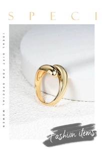 Macro view of gold adjustable drop ring with smooth finish and twisted modern design
