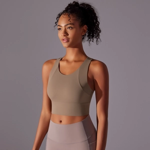 Detail of khaki sports bra showing wide shoulder straps and high-elastic textured fabric