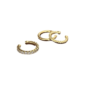 Three gold plated brass ear cuffs set featuring plain, twisted, and zircon studded designs