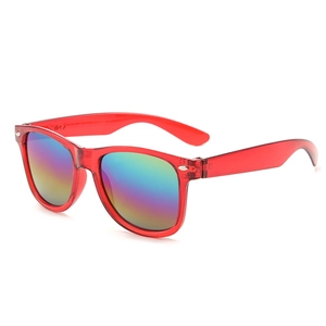 Close-up of red transparent sunglasses with colorful rainbow lenses and silver accents