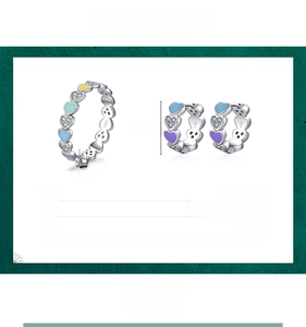 Detail view of S925 sterling silver colorful enamel heart ring and earring jewelry set