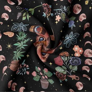 Black bohemian tapestry with mystic butterfly, moon phases, and vibrant floral patterns