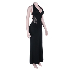 Detail of black lace stitching and knit fabric on a halter neck floor-length dress