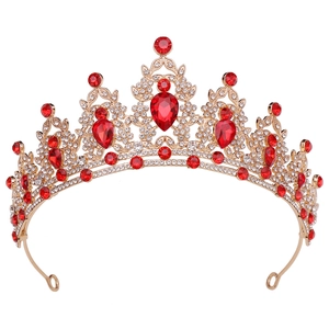 Elegant gold bridal tiara with large red teardrop crystals and sparkling rhinestones