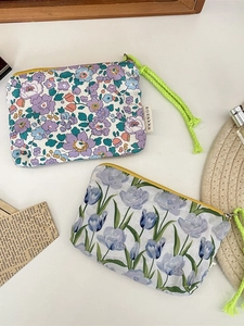 Floral cotton makeup pouch set with purple daisy and blue tulip prints and rope handles