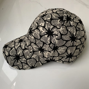 Floral baseball cap with black and grey print on a marble background for men and women