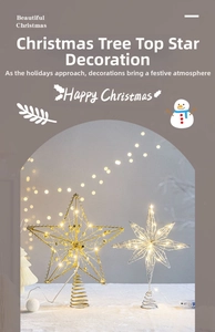 Close-up of golden LED Christmas tree star topper with wire spring base and warm light