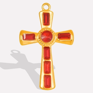 Detail of a 304 stainless steel cross pendant with red gemstones and gold finish