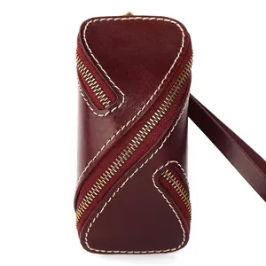 Vintage burgundy vegetable tanned leather key pouch with zipper and contrast stitching