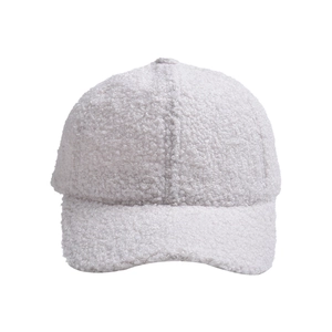Detailed view of cream fleece baseball cap showing textured lamb wool fabric and seams