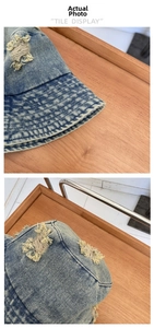 Détail de la texture denim vieilli et des coutures sur un chapeau bob vintage d'été