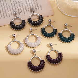 Vintage geometric leather earrings set in black, green, beige and brown colors