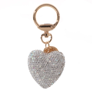 Close-up of sparkling silver rhinestone heart keychain with elegant gold metal ring