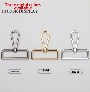 Detail showing metal lobster clasps and D-rings in gunmetal gold and silver colors