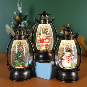 Three vintage Christmas lanterns with Santa, Snowman, and Tree glowing scenes