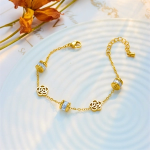 Elegant gold hollow flower bracelet with sparkling zircon charms on a delicate link chain