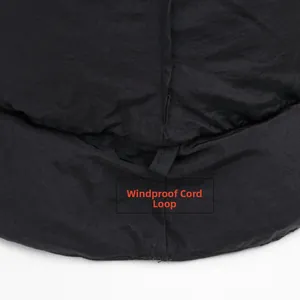Detail view of the windproof hanging loop on a thermal down fisherman hat for outdoor use